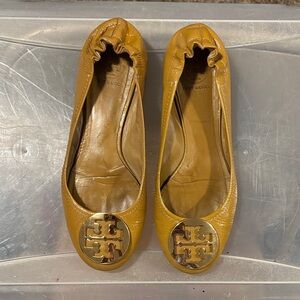 Tory Burch Yellow Flats with Gold Emblem